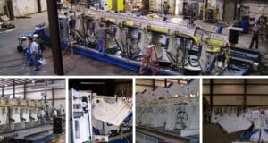 Factory workers assembling large industrial equipment.