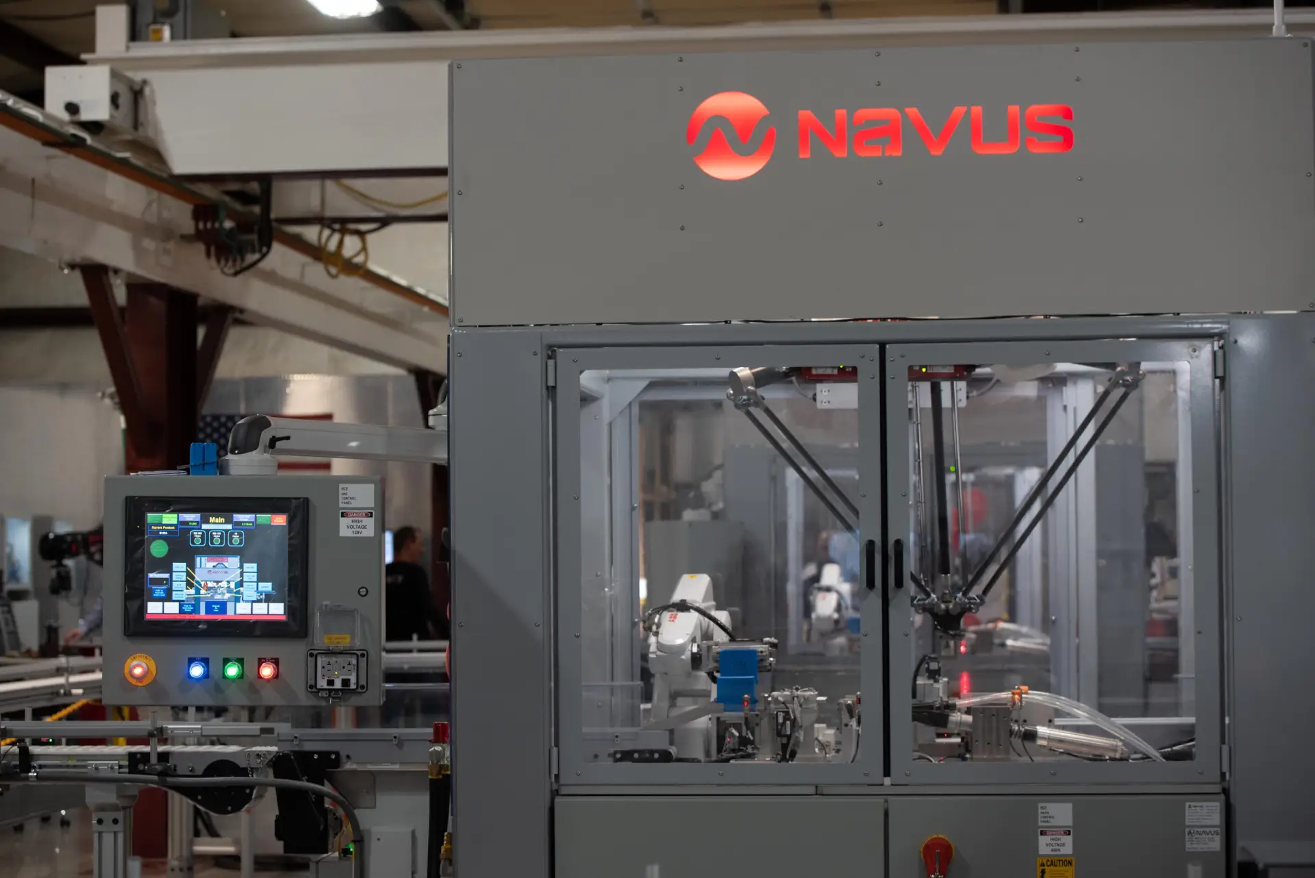 Industrial machine with control panel and logo.